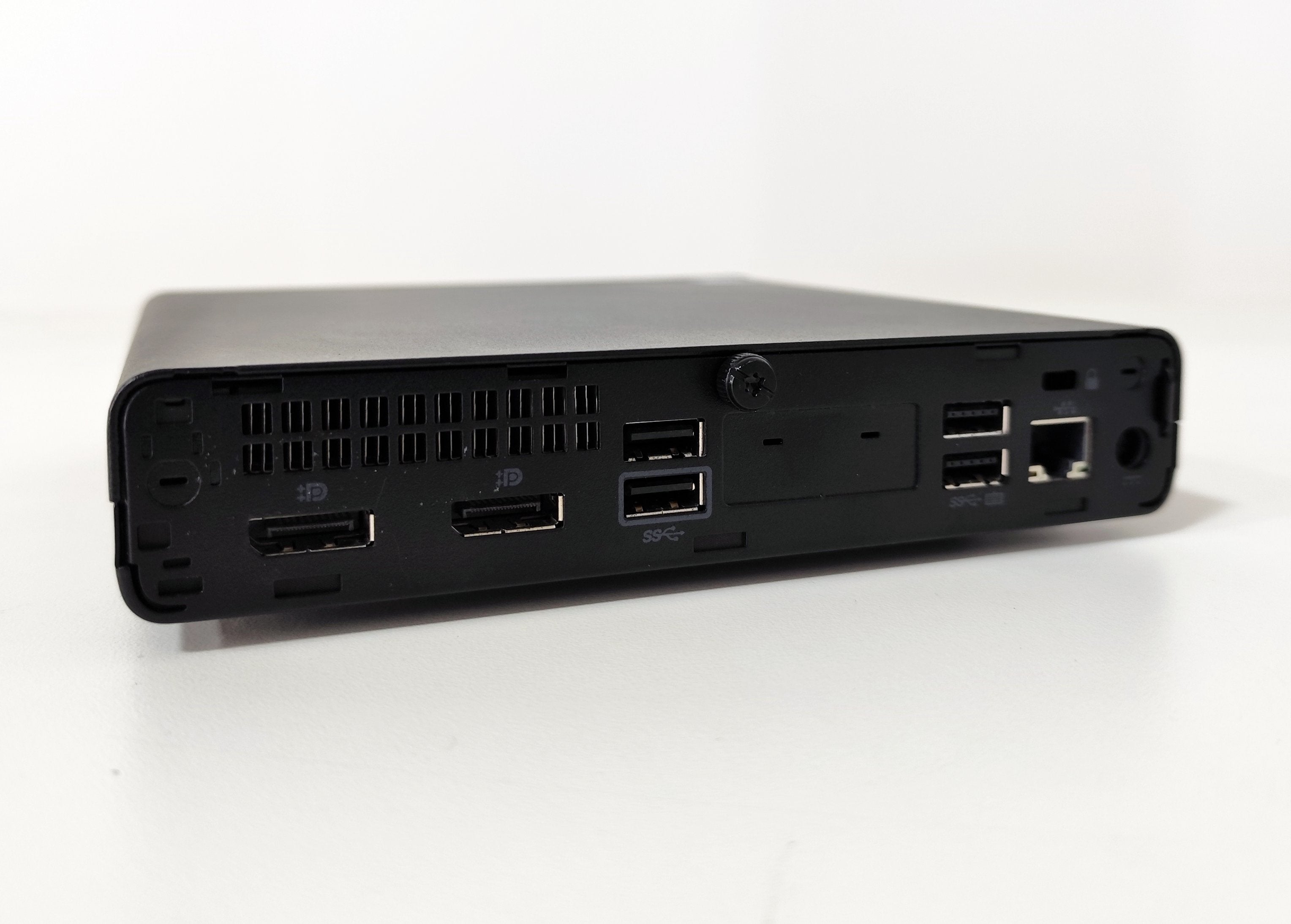 Back view of a black mini desktop PC with multiple USB ports, DisplayPorts, and Ethernet, qalnexvori.shop