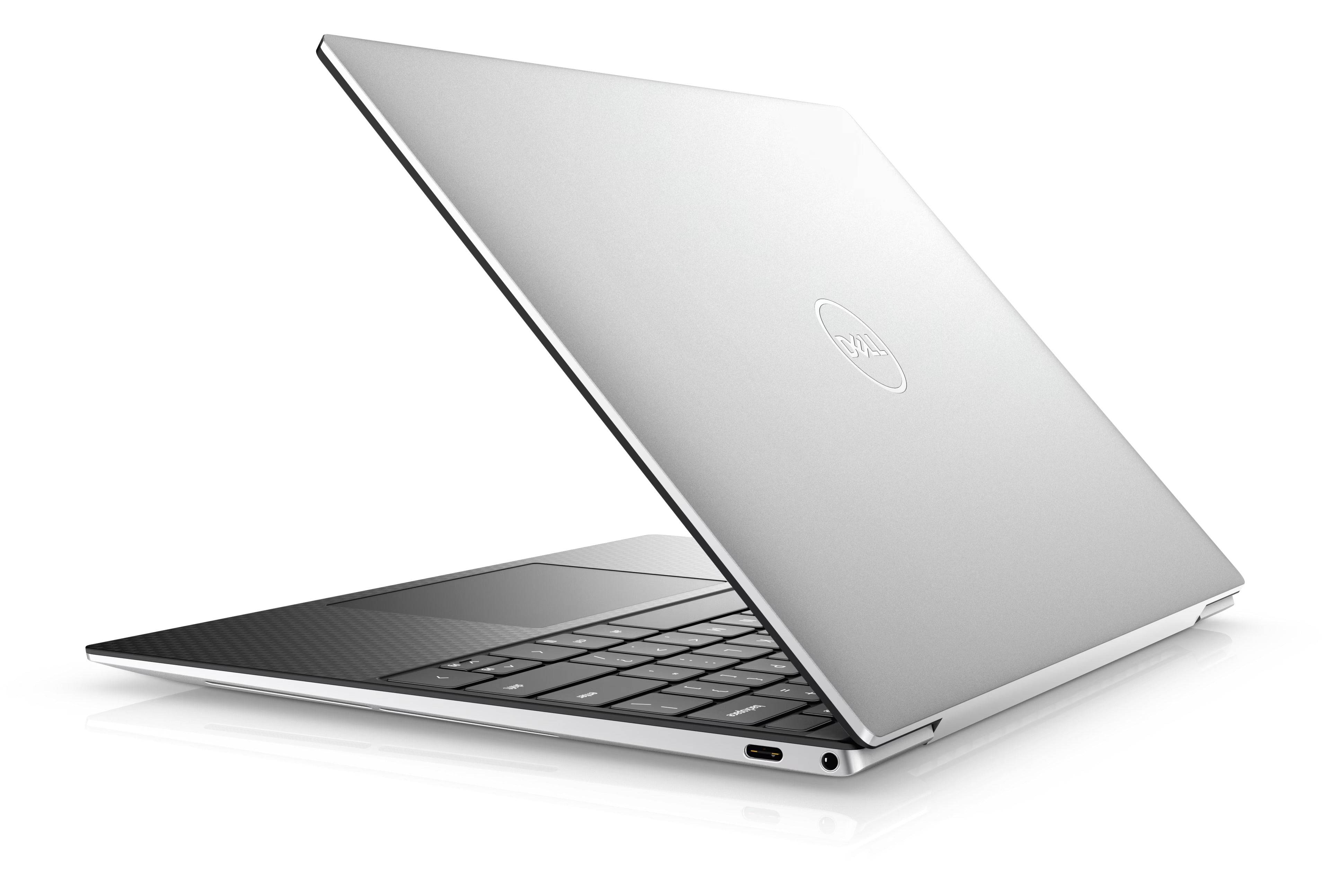 Vista posteriore del Dell XPS 9310 parzialmente aperto, design premium in alluminio con tastiera nera e finiture di pregio.